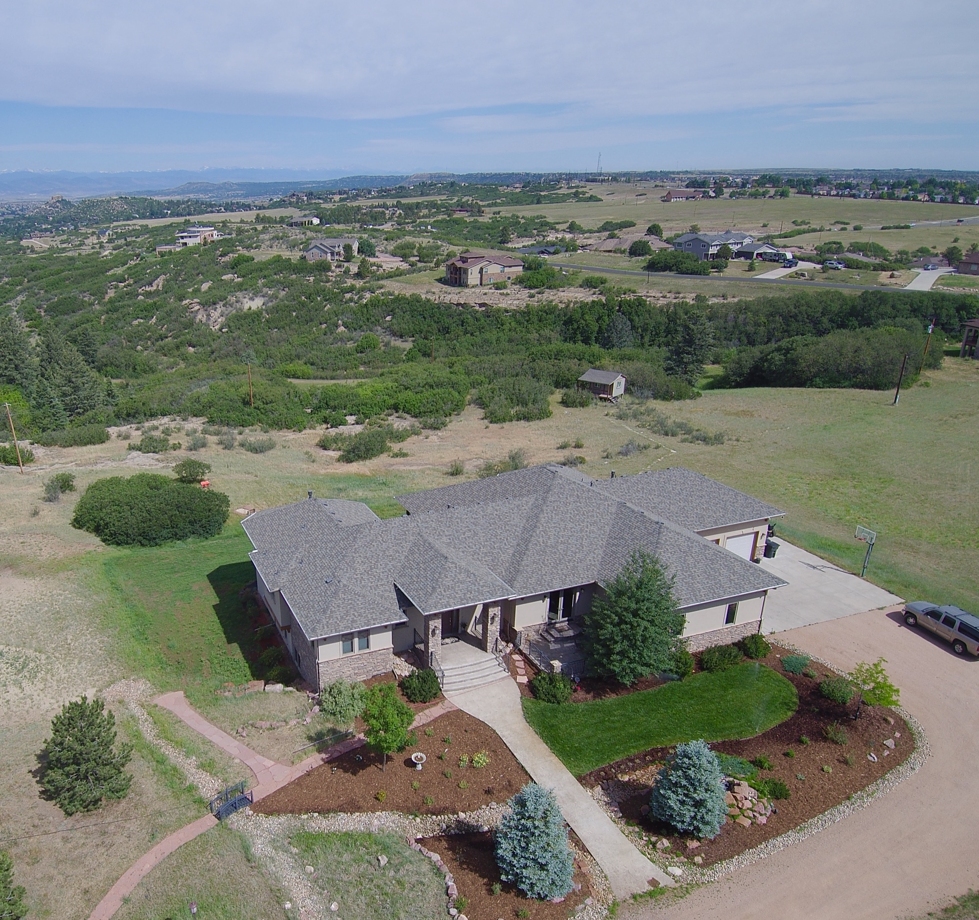 Castle Rock complete exterior replacement of roof gutters windows and stucco