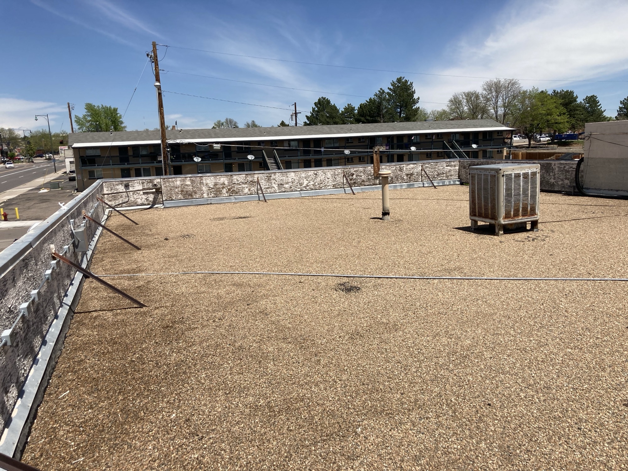 Arvada commercial work Tar and gravel ballast roof (Before) 2022